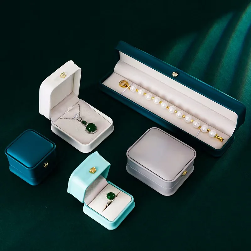 Assorted jewelry boxes in multiple shapes and colors