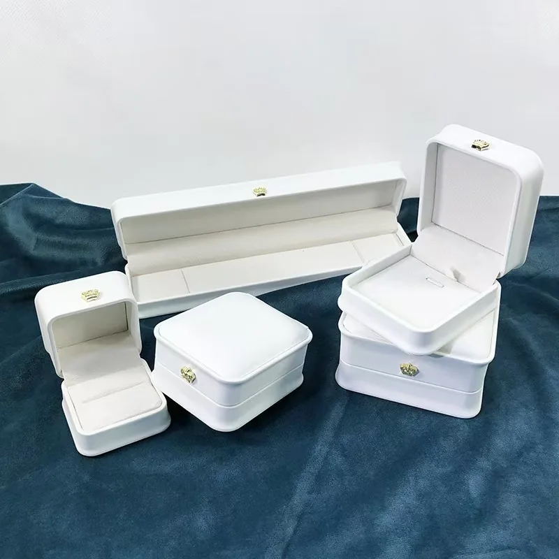 White jewelry boxes with fitted presentation inserts