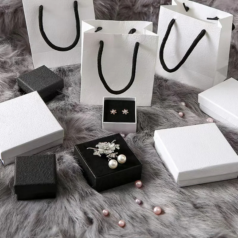 Jewelry packaging set with gift bags and presentation boxes