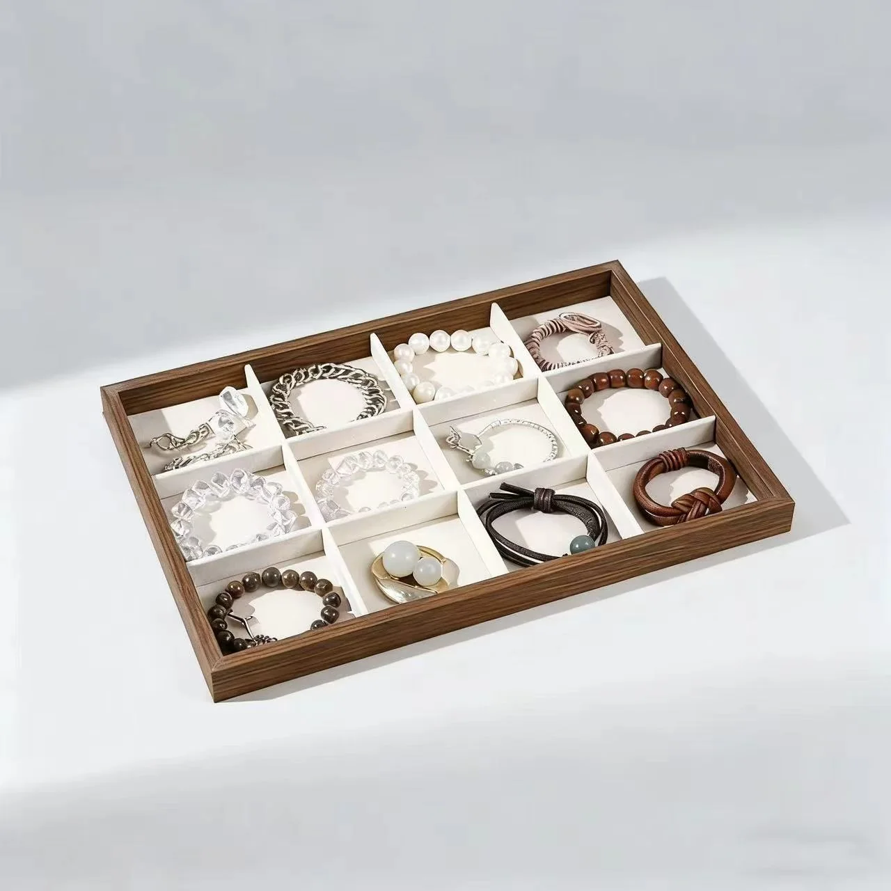 Jewelry tray with compartments for coordinated pieces